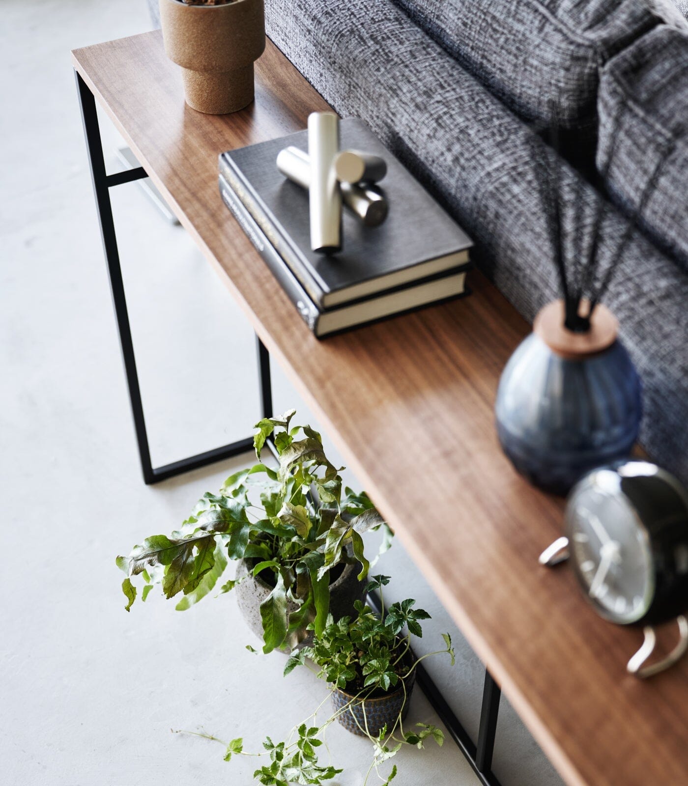 Yamazaki console table behind couch