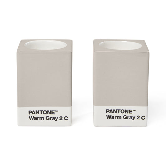 Two Copenhagen Design Pantone Warm Gray 2 candle holders without candles, showing the recessed candle openings